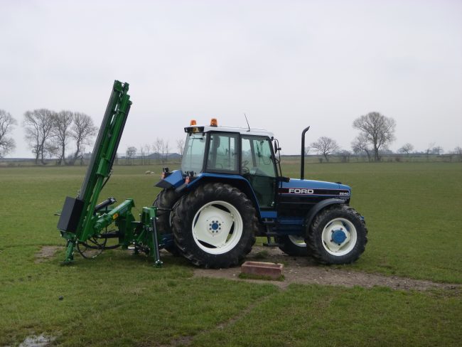 Tractor and post knocker